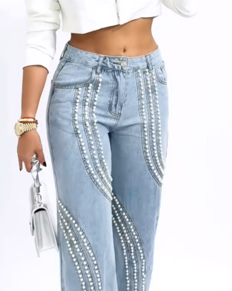Jeans mit Ornamentbesatz und geradem Bein (Vorverkauf)