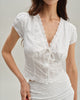 Chanel | Weiße Bluse mit strukturiertem Stoff und kurzen Ärmeln