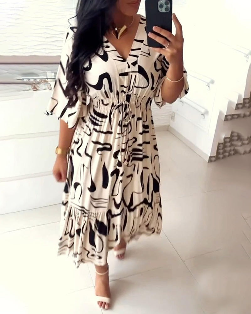 Catty |  V-ausgeschnittener Taillendruck bedrucktes Kleid