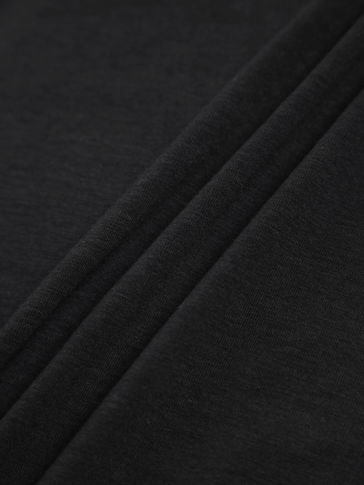 Clara | Glitzerndes Top mit Schleifenverzierung