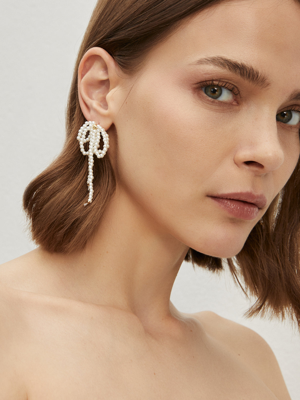 Emilia | Elegante Perlenohrringe mit Schleife und Quaste