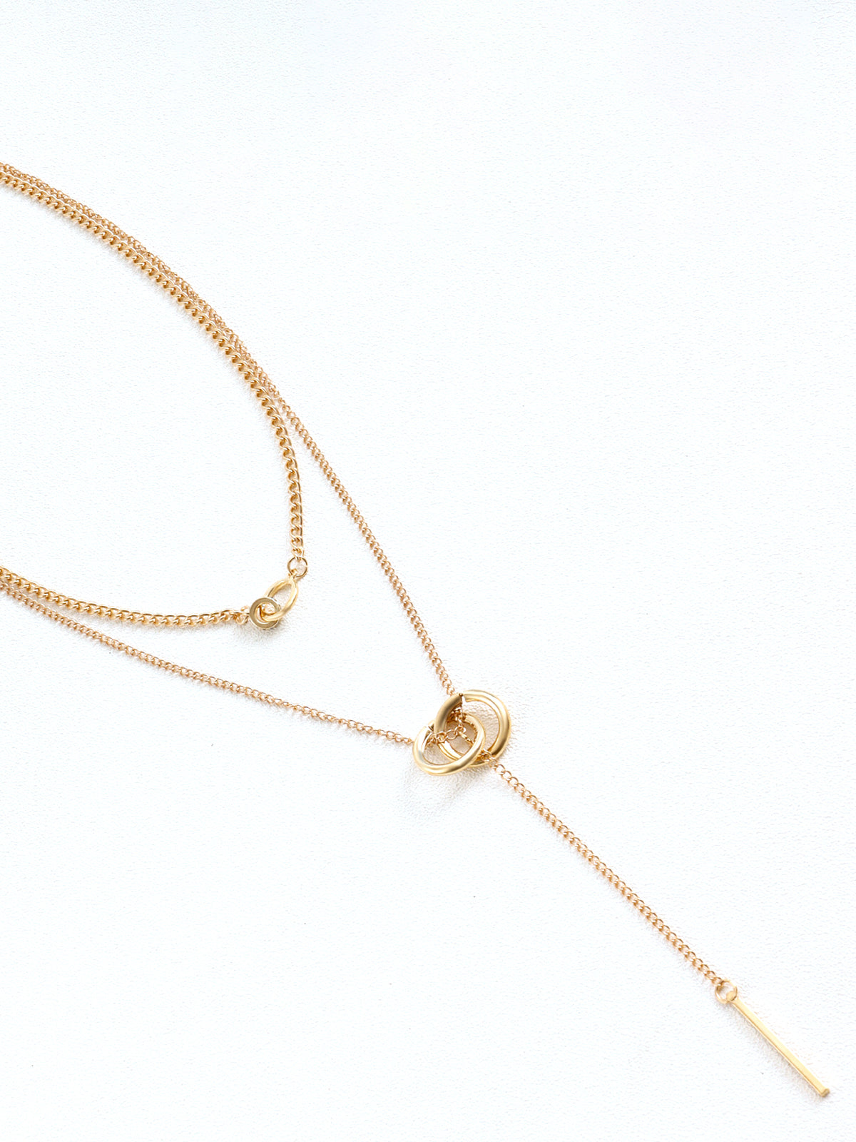 Laura | Elegante Halskette mit doppeltem Kreis und Quasten