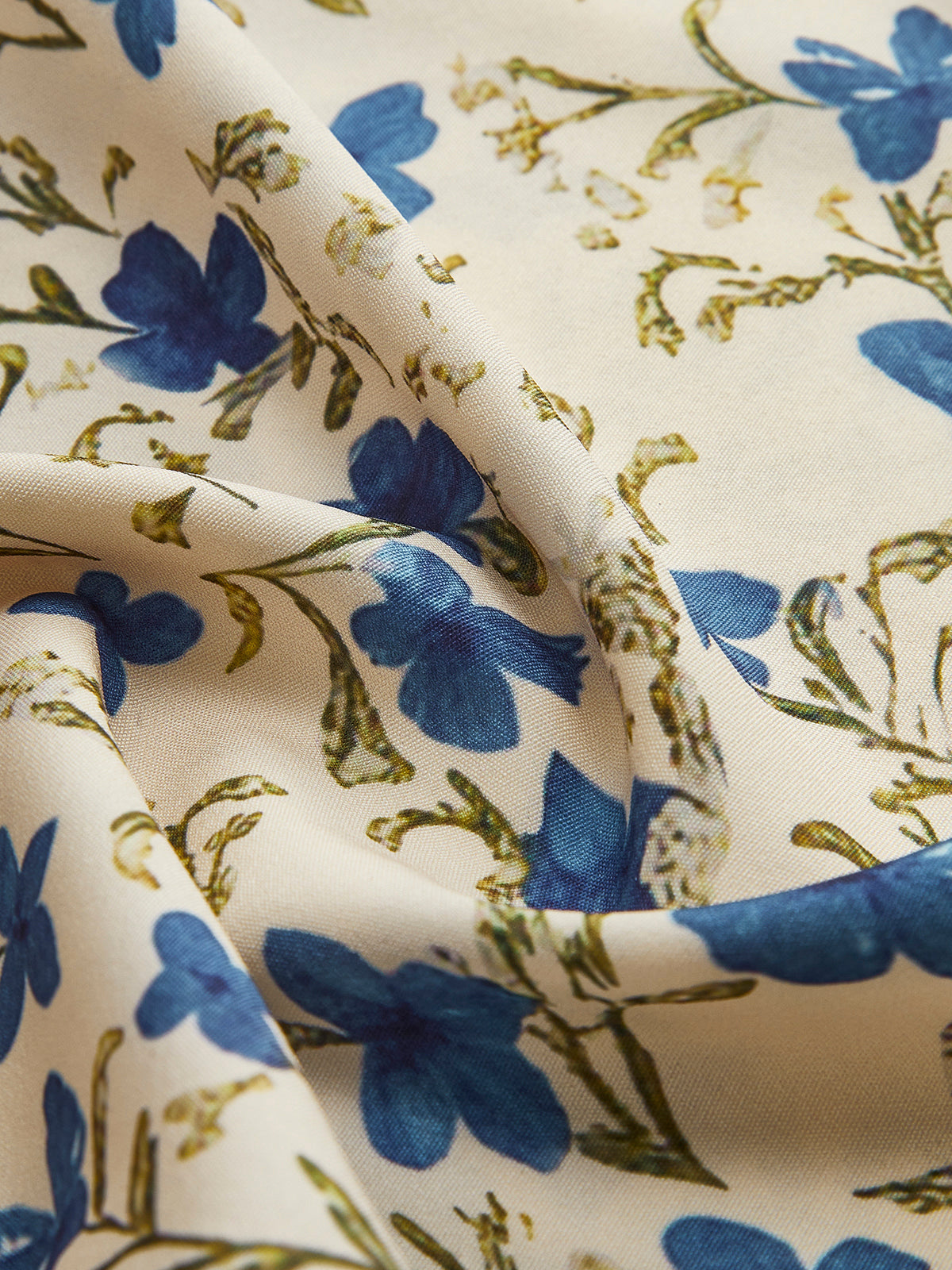 Clara | Romantisches Blumenmuster Kleid mit unregelmäßigem Saum