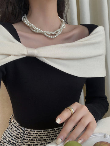 Max | Eleganter Pullover mit Farbblockschleife