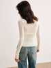 Clara | Semi-transparente Strickbluse mit Blumendesign