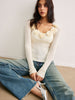 Clara | Semi-transparente Strickbluse mit Blumendesign