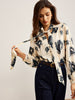 Clara | Elegante Satinbluse mit Krawattenausschnitt