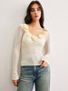 Clara | Semi-transparente Strickbluse mit Blumendesign