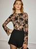 Clara | Elegante Bluse mit Glockenärmeln und halbtransparenter Beflockung