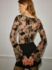 Clara | Elegante Bluse mit Glockenärmeln und halbtransparenter Beflockung