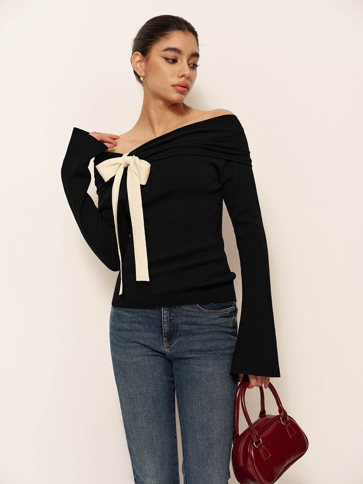 Emilia | Elegantes Strickoberteil mit Schleifen-Dekoration
