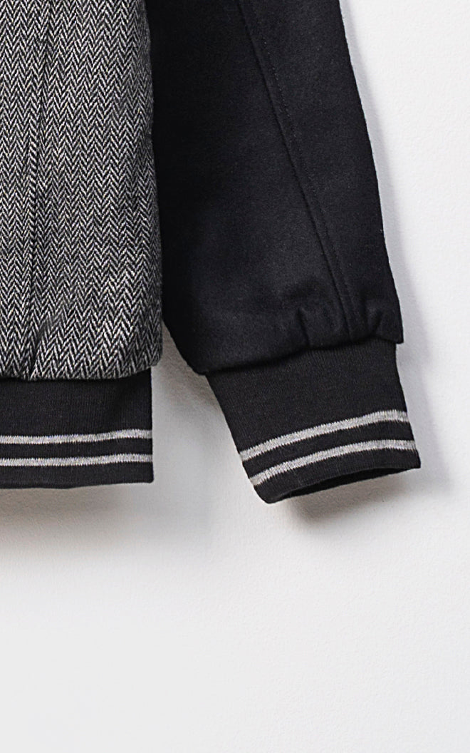 Milo | Wolljacke mit Kontrastärmeln & Fischgrätmuster