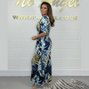Wella | Stilvolles Sommerkleid mit großem Blattdruck, elastische Taille