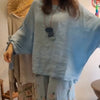 Treya | Damenbluse mit lockerem Schnitt und weite Hose mit Blumenprint