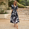 Kaisera | Elegantes Kleid mit Taillendruck und V-Ausschnitt