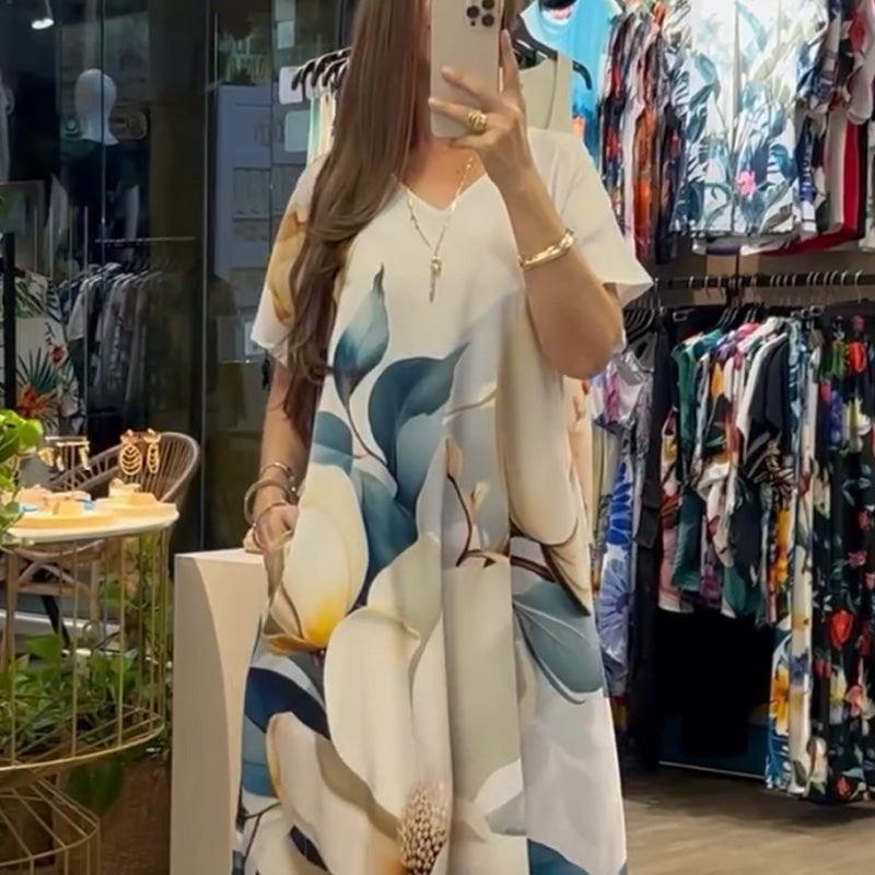 Mohamed | Lockere, lässige Damenkleider mit V-Ausschnitt und bedruckten Kurzarm